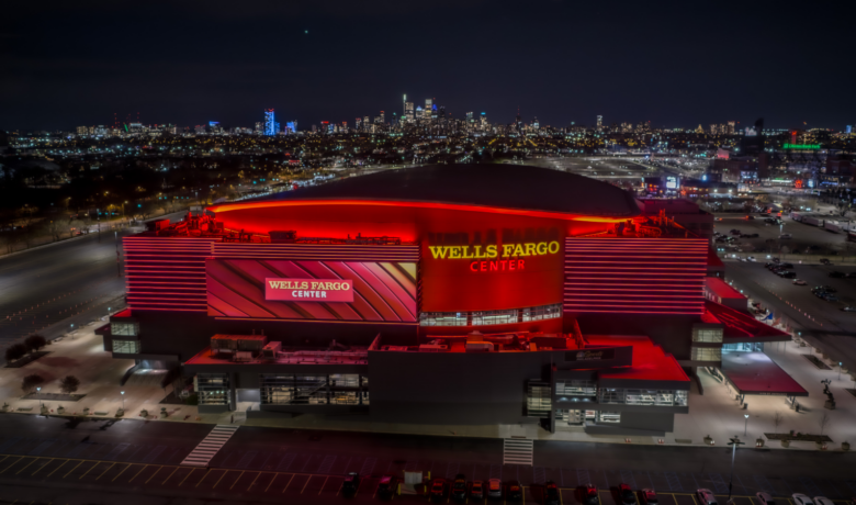 Wells Fargo Center lit up at night